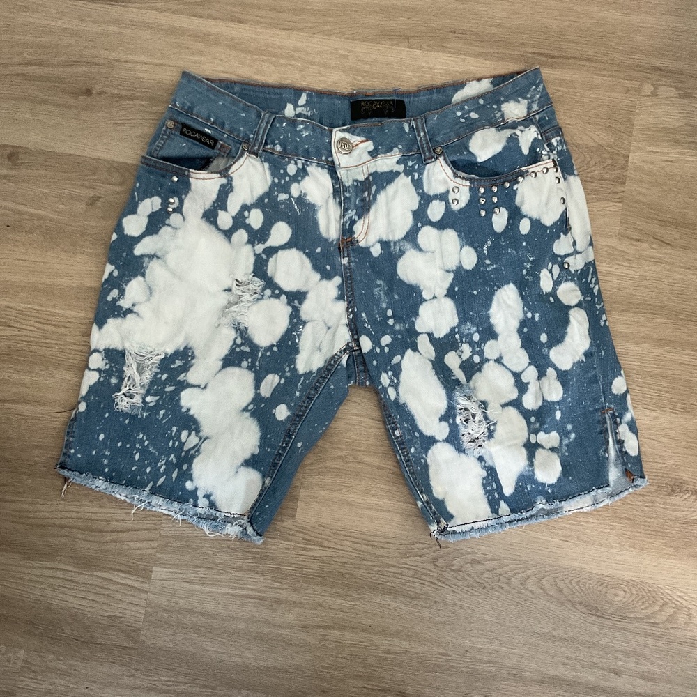 Rocawear vintage women Jean shorts color blue and white size 18
